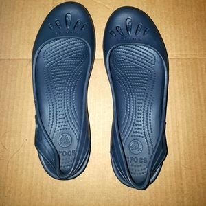 Like new crocs slip on flats navy 9